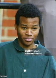 Defense attorneys Mark Petrovich and Michael Arif enter the court... News  Photo