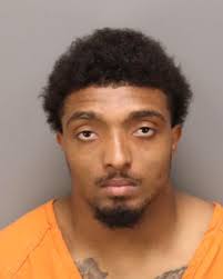 Former Largo, Miami football star charged in triple fatal crash