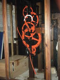 The hands have a serpentine style that complements the clock's style. Castle Combe Clock Wikipedia