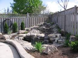 A diy waterfall will produce the sound of running water in your own backyard that will soothe the soul and calm the mind. Waterfall Waterfalls Backyard Backyard Pool Landscaping Waterfall Landscaping