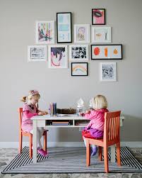 The giant multi directional sofa is a huge hit with parents and kids, as is the eco friendly plyboo toy storage credenza incorporating recycled plastic tubs. Kid Friendly Living Room By Design Improvised Hayneedle Blog