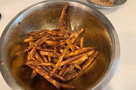 Five guys prides itself on always perfect french fries, with every server going through special fry calibration training to ensure they never serve up a soggy chip. Copycat Five Guys Cajun Fries Recipe Air Fryer Or Oven