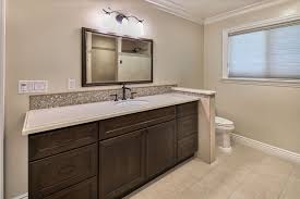 This combination is best paired with a light backsplash material which acts as a complementary visual element that makes both the countertop and cabinets stand out. Dark Brown Bathroom Cabinets Crystal Cabinets