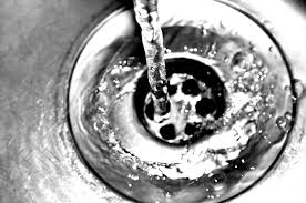 warning signs of a clogged drain