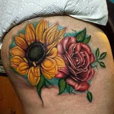 The rose and sunflower tattoo designs were filled with a special symbolism for centuries, they could tell a lot about a person, his nature and mans personality. Red Rose And Realistic Sunflower Tattoo Sunflower Tattoo Simple Sunflower Tattoos Sunflower Tattoo Small