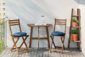 No Matter How Small Your Balcony Might Be There S Probably Place For Some Askholmen Woode Porch Table And Chairs Outdoor Tables And Chairs Wooden Garden Table