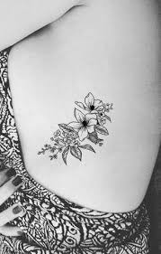 Black Small Wild Rose Rib Tattoo Ideas For Women Pretty Floral Flower Side Tat Ideas Pequena Delicate Flower Tattoo Small Flower Tattoos Flower Tattoo Back