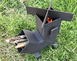 Rocket Stove Self Feeding Gravity Feed Design New Improved Cooking Grate All Welded Steel Construction Ironoflife Holzofen Raucherofen Bauen Und Gartenofen