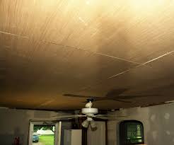 The recent revival in wood wall paneling is an alternative to painted drywall treatments for residential walls. Ditch The Drywall Hanging Plywood Ceiling Panels 6 Steps With Pictures Instructables