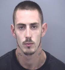 Banned driver led police