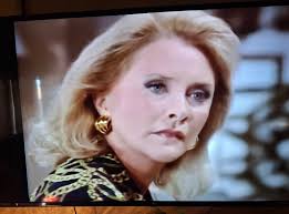 Is a blouse worn by a character familiar?