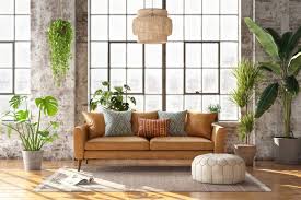 One large potted palm behind the sectional and two small plants (one on the mantel; Decorating With Plants How To Incorporate Plants Into Your Home Decor