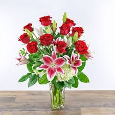 To send an online condolence to the family, visit mccombs funeral home website at www.mccombsfuneralhome.com; Enchanting Dozen In Urbandale Ia Plaza Florist Gifts