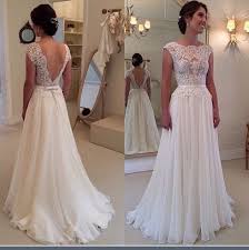 Pretty Simple Yet Elegant Backless Lace Wedding Dress Wedding Dresses Wedding Dress Cap Sleeves