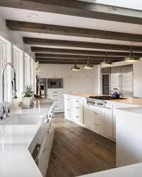 Lovely Rustic Wood Accents In Modern White Kitchen Kitchen Ceiling White Modern Kitchen Kitchen Design