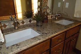 The most popular natural stone countertop material, granite is resistant to heat and scratches and lends a luxurious look to a kitchen. Granite Bathroom Countertops Liberty Home Solutions Llc