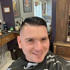 THE RUSTIC ROOSTER BARBER