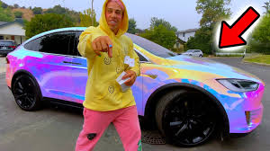 Jojo siwa has more money at 17 than the rest of us will ever have. Tesla Owner Graffitis Own Car For Bizarre Unicorn Wrap