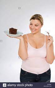 Browse 156 fat woman eating cake stock photos and images available, or search for overweight to find more great stock photos and pictures. Fat Woman Eating Cake Stock Photo Alamy