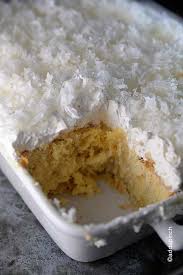 One Of Our Family S Favorite Cakes We Make It Every Easter I Tried Doubling The Coconut Sauc Coconut Recipes Coconut Cake Recipe Ultimate Coconut Cake Recipe