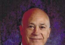 Couple voice support for Mack Knupp