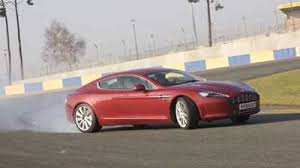 Image result for Magma Red 2011 Aston Martin