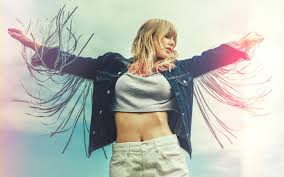 We present our wallpapers for desktop of taylor swift in high resolution and quality, as well as an additional full hd high quality wallpapers, which ideally suit for desktop not only of the big screens, but also on the screens of android and iphone. American Blonde Denim Shirt Taylor Swift Wallpaper Background Image Ubackground Com