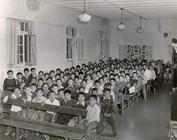 Residential schools were schools set up by the canadian government to assimilate first nations children into (predominantly wasp, and in quebec, french catholic) canadian culture. The Residential School System