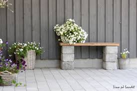 Cinder blocks are the foundations for outdoor rock walls. How To Use Cement Blocks In Practical Outdoor Projects