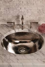 In modern bathroom design, stainless steel is often used to reinforce a clean, minimal design spirit. Stainless Steel Oval Bath Sink With Hammered Interior Architonic