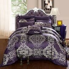 As the quilt maker, you're the artist and it's your vision that's being realized. Luxury Classic Queen Size Bed With Deep Purple And Silver Patterned Comforter And Cushion As Well As Dark P Purple Bedding Luxury Comforter Sets Luxury Bedding