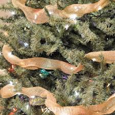 Garlands with paper, flowers, tassel, carrots, rabbits, burlap and more. Rustic Christmas Tree With Burlap Ribbon Ideas For The Home