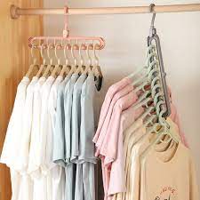 Online shopping for home & kitchen from a great selection of coat hangers, standard hangers, trouser hangers, accessory hangers, suit hangers, skirt hangers & more at everyday low prices. 1 2pcs Magic Multi Port Support Hangers For Clothes Drying Rack Multifunction Plastic Clothes Rack Drying Hanger Storage Hangers Hangers Racks Aliexpress