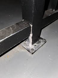 Unlike conventional liquid paint which is delivered via an evaporating solvent, powder coating is typically applied electrostatically and then cured under heat or with ultraviolet light. What Is This White Stuff On This Powder Coated Aluminum Or Steel Rails Metalworking