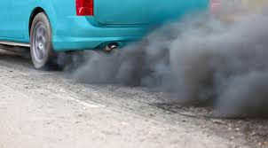 The car emitted black smoke while driving.