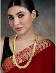 Aheli Wedding Wear Gold Tone Goddess Engraved