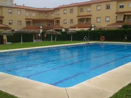 Casa en punta umbria con piscina común. Alquiler De Casa En Punta Umbria Pueblo Urb El Coto De Punta Umbria Tucasa Com