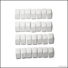 At the beginning of a game, the hands are dealt by randomly shuffling all tiles and distributing seven (7) tiles (also called bones or dominoes) to each player. Bare Bones Raw Concrete Domino Set Is Art For The Table If It S Hip It S Here