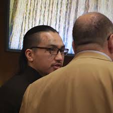 Jail murder suspect's attorney raises question of whether victim killed  gang member