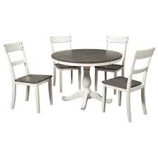 Or, sit elegantly in one of our leather dining chairs and enjoy the lavish charm of our wooden dining tables. Signature Design By Ashley Nelling Farmhouse Two Tone 5 Piece Round Dining Table Set Royal Furniture Dining 5 Piece Sets