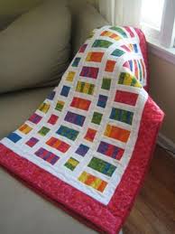 Both experienced quilters and beginner quilters will love this 36″ x 48″ quilt. Fat Quarter Baby Quilt Pattern 9 Stitches