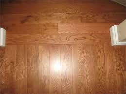 The laying of hardwood flooring on the long side emphasizes the room shape. Welcome Champagneflooring Com Bluehost Com Wood Floors Wide Plank Maple Hardwood Floors Transition Flooring