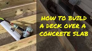 The interlocking plastic base makes tiles very easy and quick to apply and no tools required. How To Build A Deck Over A Concrete Slab Youtube