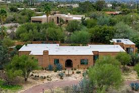 See investigators search Nancy Guthrie's house outside Tucson