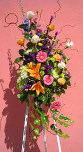 Interflora flowers charges anywhere from twenty to over one hundred dollars depending on the type and amount of flowers you want to send. Funeral Flowers Standing Sprays Funeral Flowers Funeral Flower Arrangements Memorial Flowers