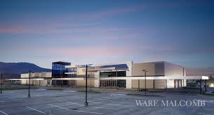 Read About Ware Malcomb Panama Town Center Retail Project In Panama Pacifico Architecture Steel Buildings Steel Building Cost Building Costs