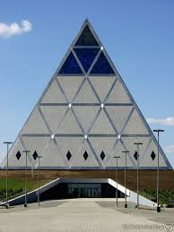 Astana pyramid as you can see on one side/face are 15 upright triangles.the article mention pythagoras.what comes to mind is the pythagoras tetragrammaton in tetraktys form. Kazakhstan And The Illuminati In An Unfinished Metropolis Atlas Obscura