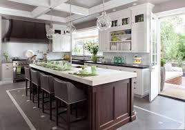 White Perimeter Cabinets W Black Counters Dark Stained Island W Light Stone Counter Kitchen Patio Doors Kitchen Design Kitchen Island With Sink