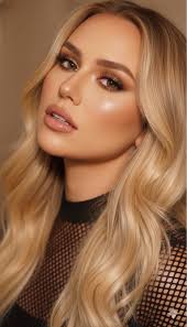 NenaGhosty 🖤 A glamorous close-up portrait of a beautiful woman cap...