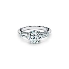 Most women consider anything around 2.5 carats as big, while the average size for an engagement ring is 0.75 carats. Tiffany Three Stone Engagement Ring With Baguette Side Stones In Platinum
